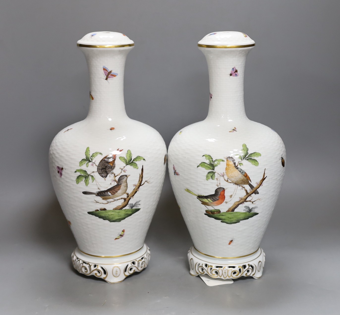 A pair of Herend Rothschild Birds pattern lamps, lacking fittings and wiring, 32cm tall